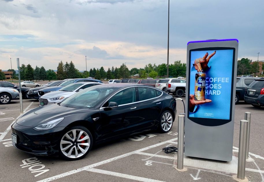 A Tesla Charging At Volta Charging Station