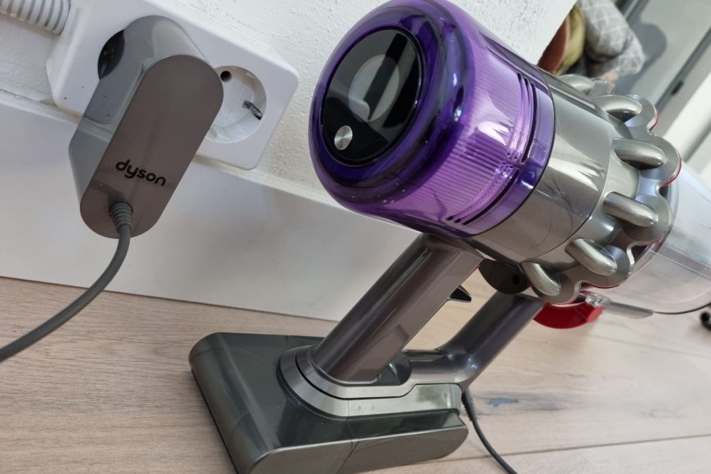Dyson vacuum is charging with its charging cable plugged in